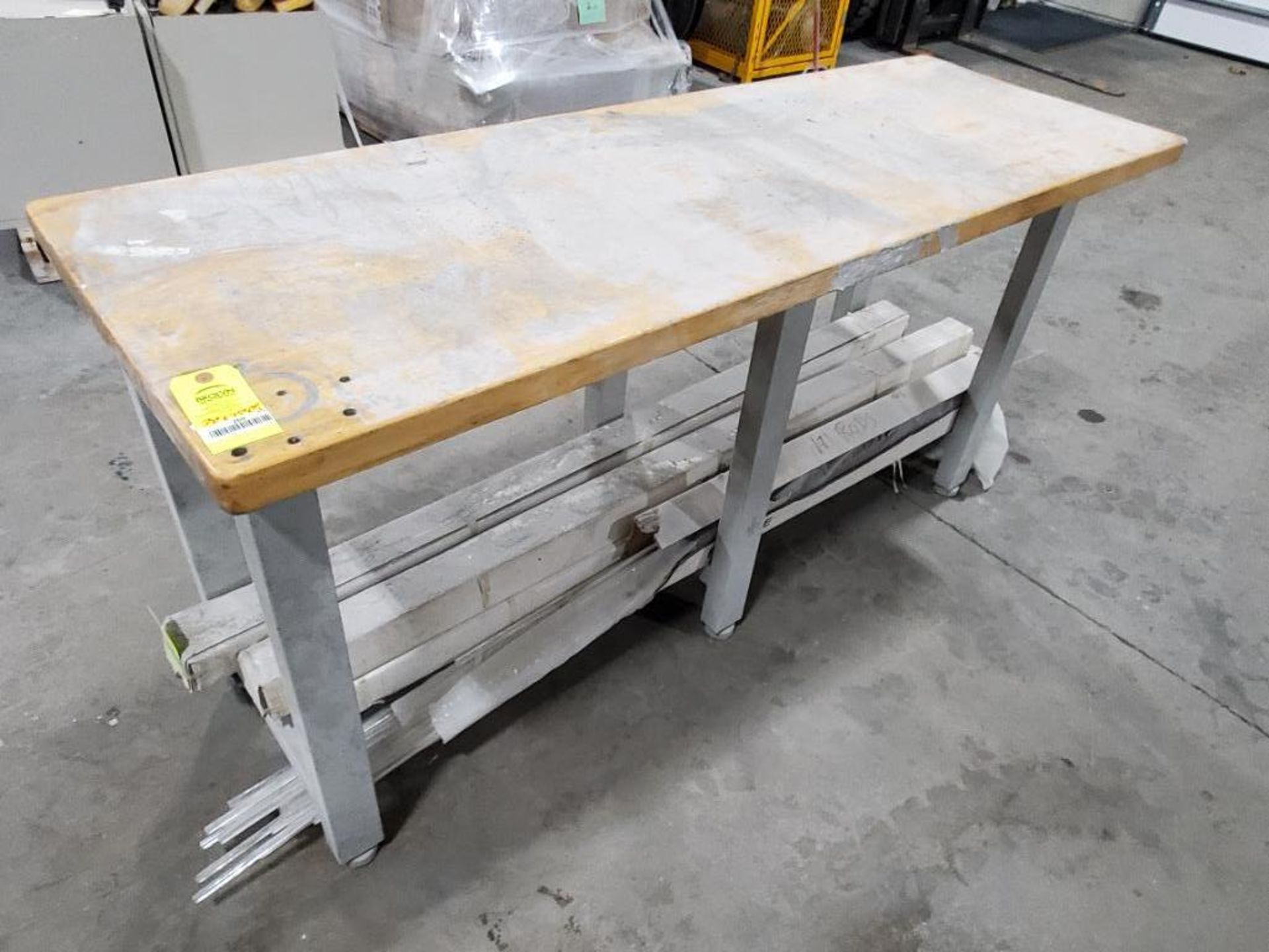 Wood top work bench. 72in x 25in x 30in tall.