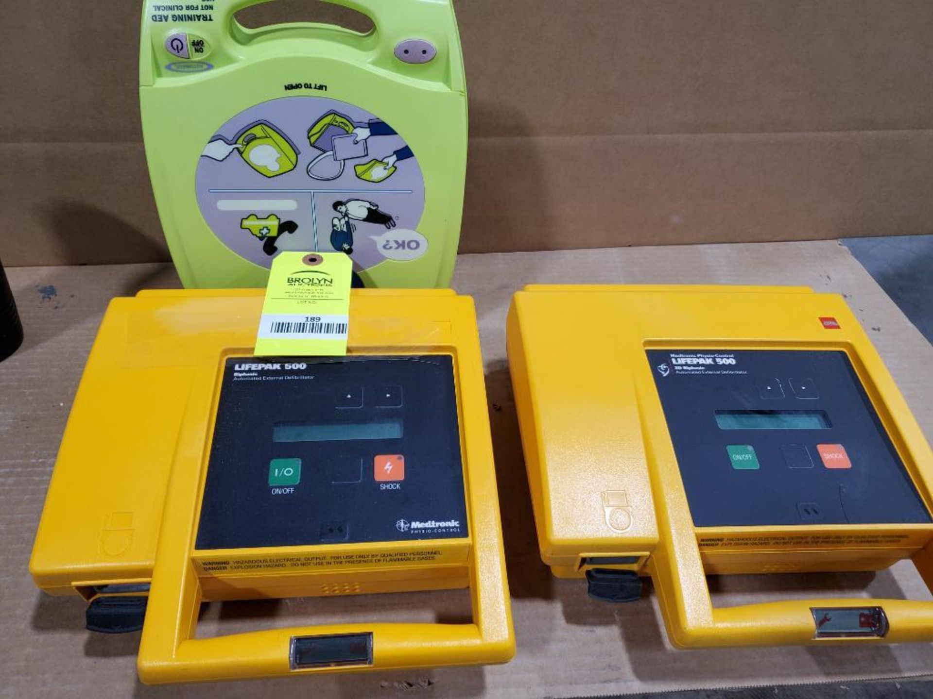 Qty 3 - Assorted automatic defibrillator.