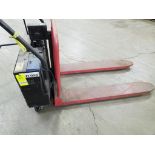 2500lb capacity battery operated power pallet jack. Built in charger.