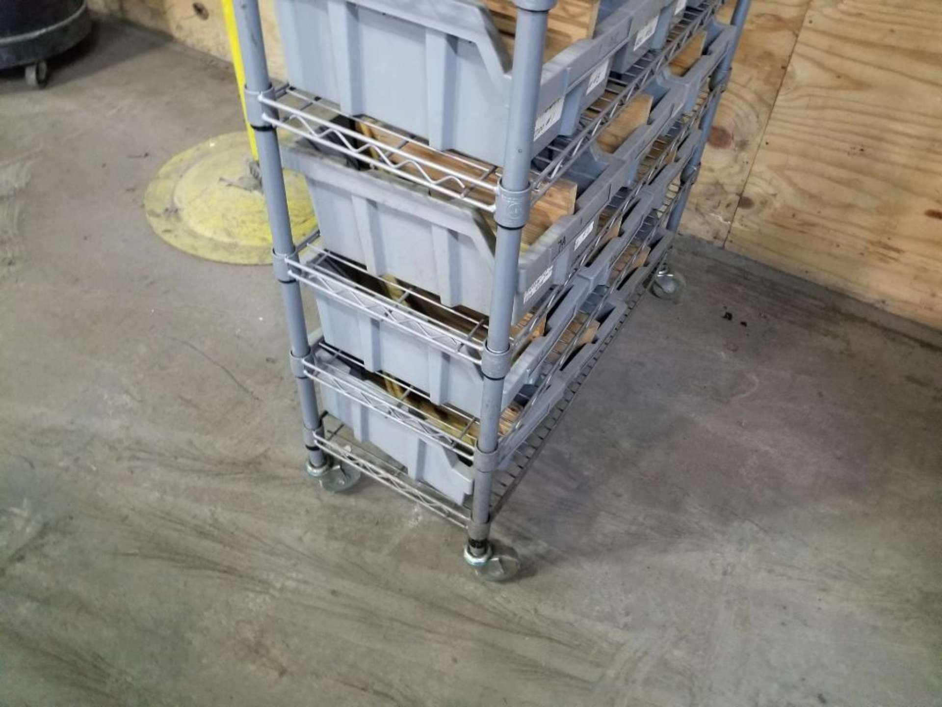 Metro style storage rack with bins. 36in x 14in x 59in. For a $60 fee ...