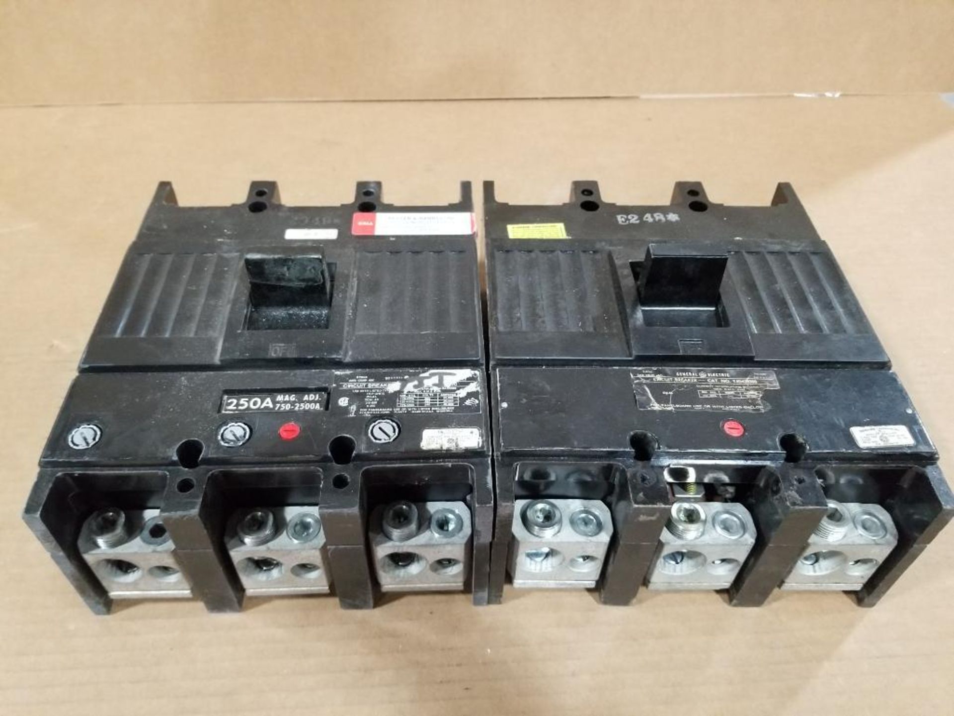 Qty 2 - GE Molded case circuit breakers.
