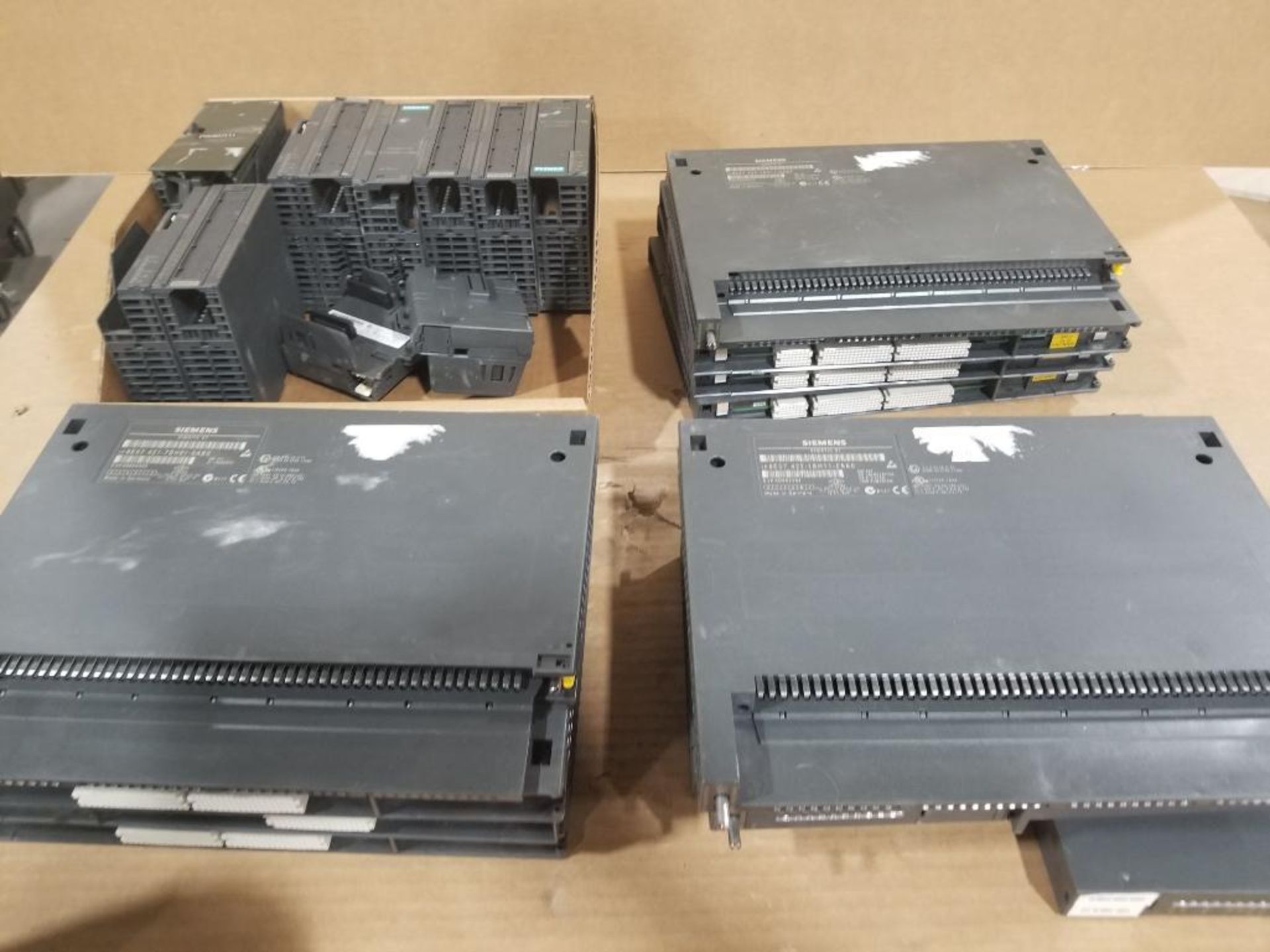 Large assortment of Siemens PLC cards.