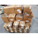 Pallet of assorted electrical and/or repair parts.