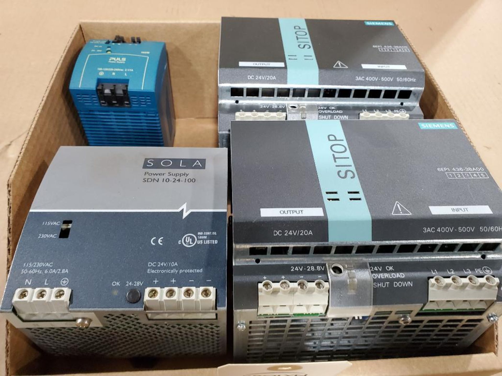 Qty 4 - Siemens Sitop, Sola, and Puls power supplies.