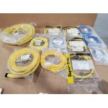 Assorted electrical interconnect cables.