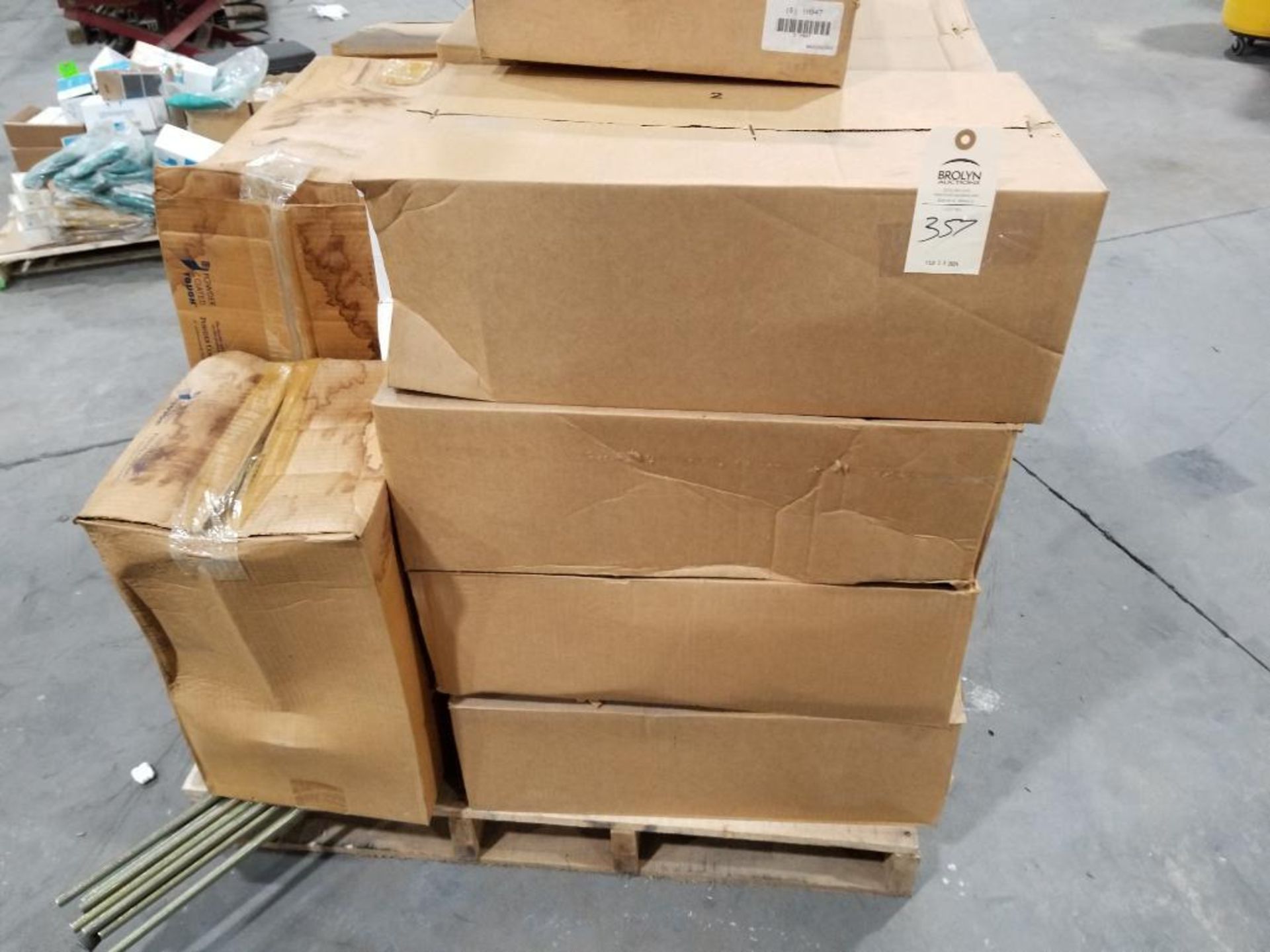 Pallet of assorted electrical and/or repair parts.