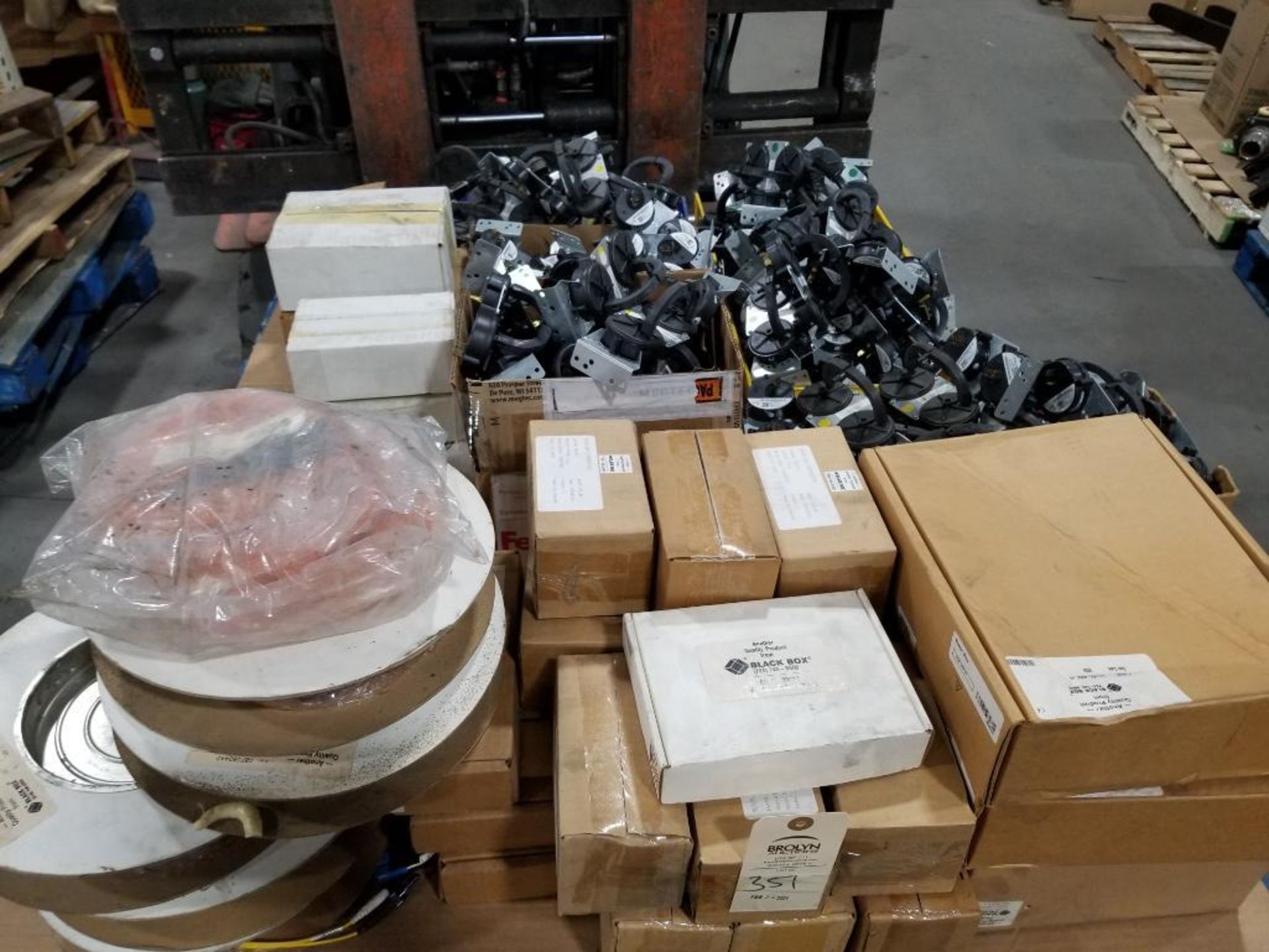 Pallet of assorted electrical and repair parts.