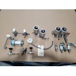 Assorted pressure switches and pneumatic parts.