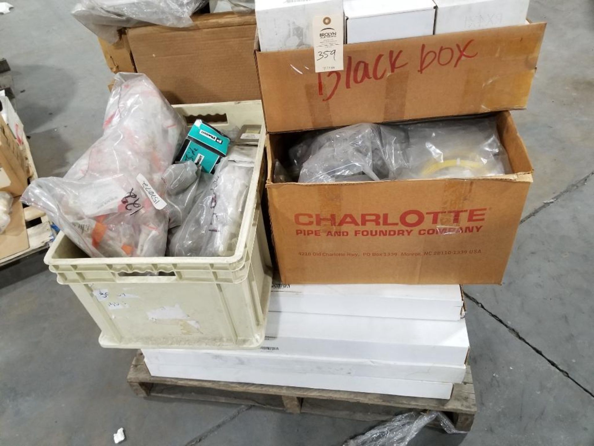 Pallet of assorted electrical and/or repair parts.