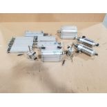 Assorted pneumatic cylinders and actuators.