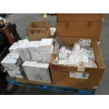 Pallet of assorted electrical and repair parts.