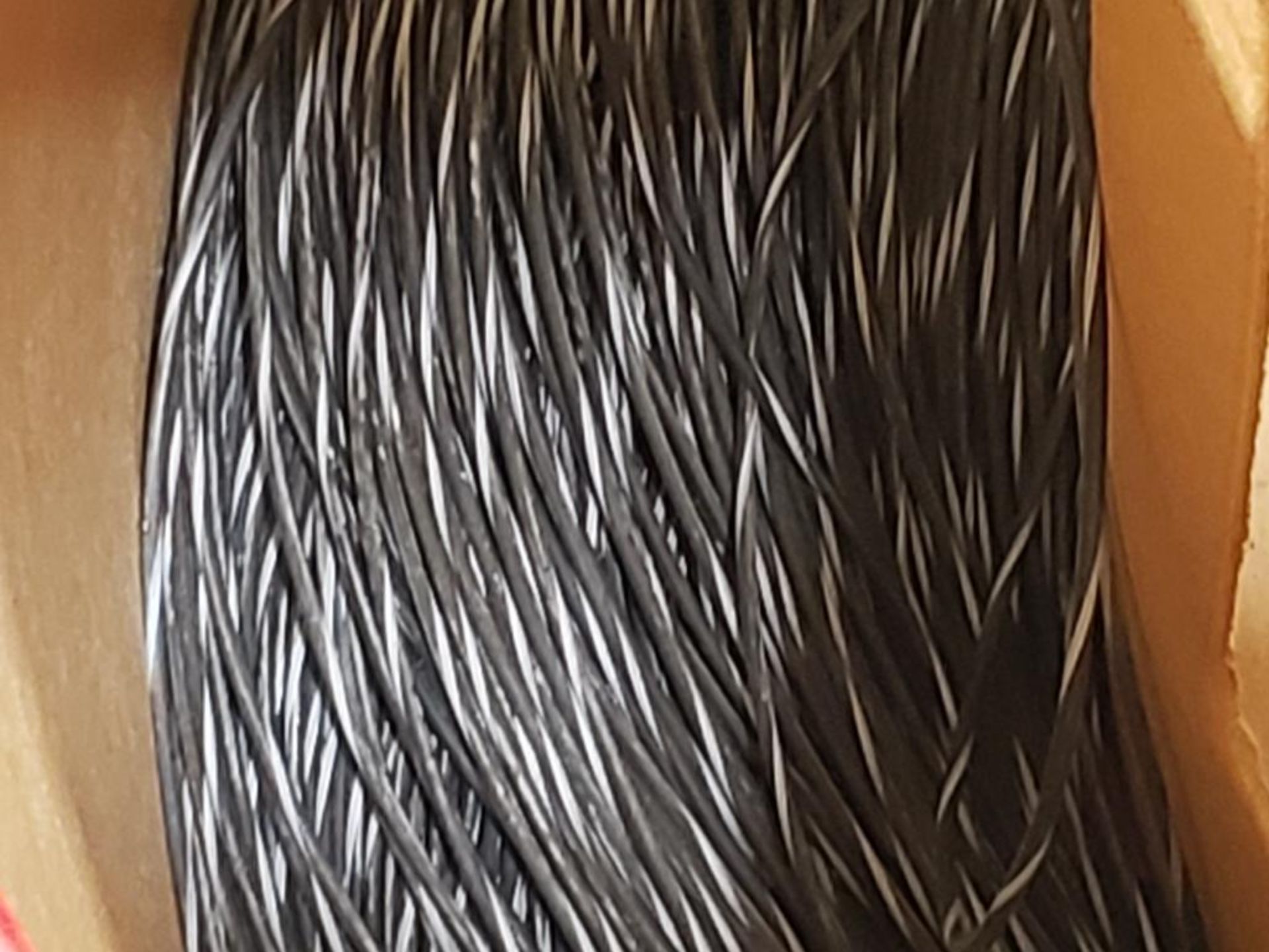 16 awg black / white print copper wire. Gross barrel weight, 79lbs. Partial barrel. - Image 2 of 4
