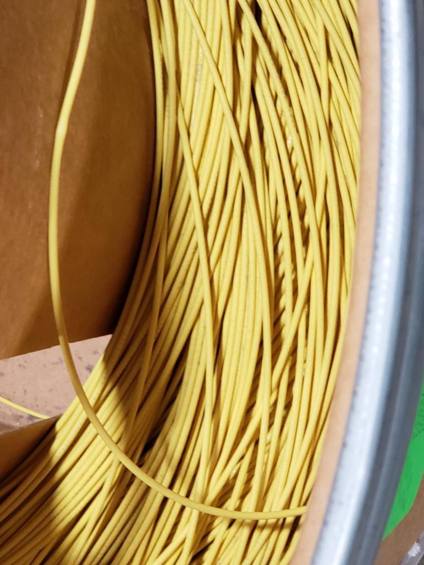 14 awg yellow print copper wire. Gross barrel weight, 226lbs. Partial barrel. - Image 2 of 5