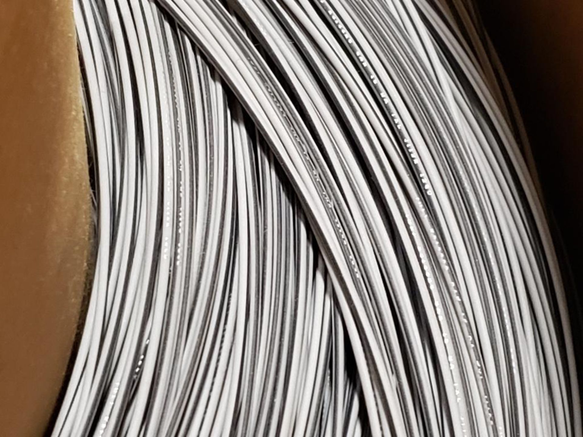 16 awg gray / black print copper wire. Gross barrel weight, 280lbs. Partial barrel. - Image 2 of 5