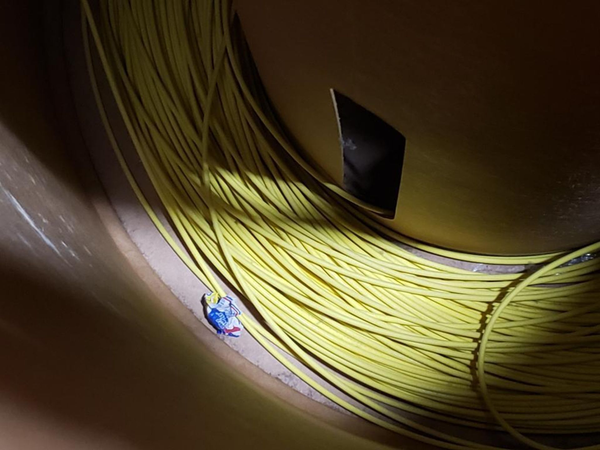 Qty 2 - Barrels 16 awg tan and 12 awg yellow print copper wire. Gross barrel weight, 60lbs. Partial - Image 5 of 10