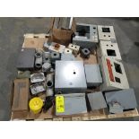 Pallet of assorted enclosures and conduit fittings.