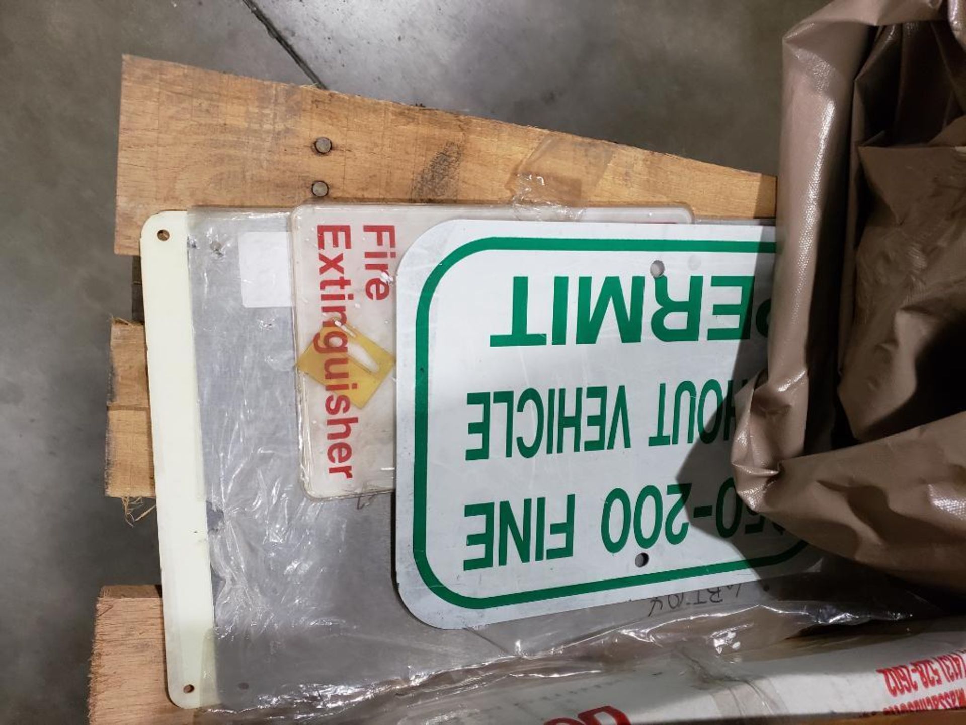 Pallet of assorted tarps, safety goggles, and other parts. - Image 16 of 23