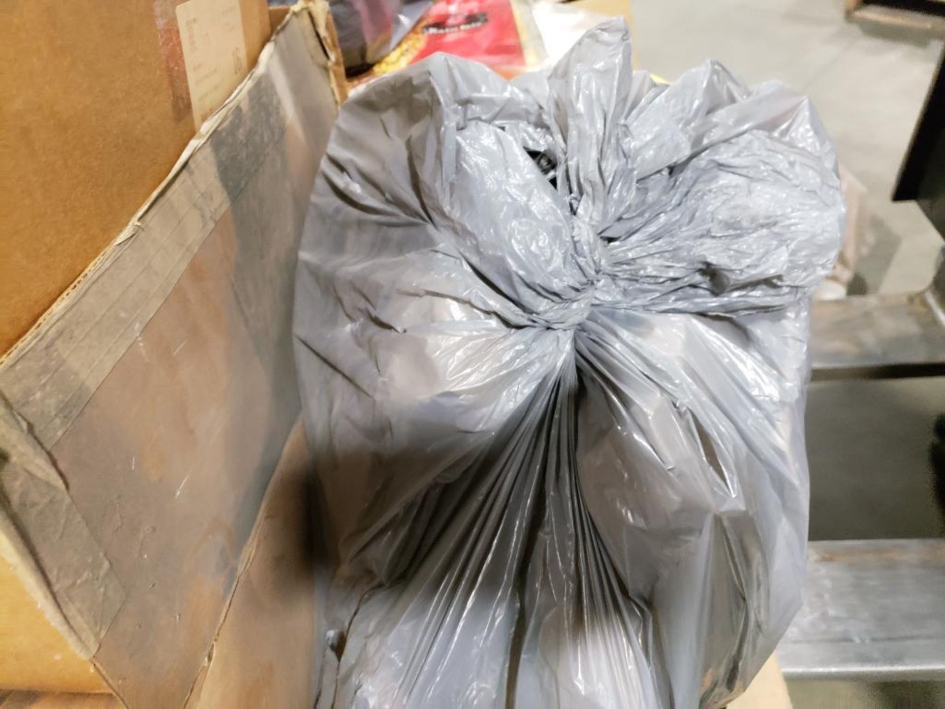 Pallet of assorted tarps, safety goggles, and other parts. - Image 10 of 23