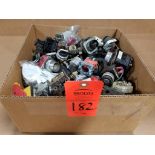 Large assortment of push buttons and switches.