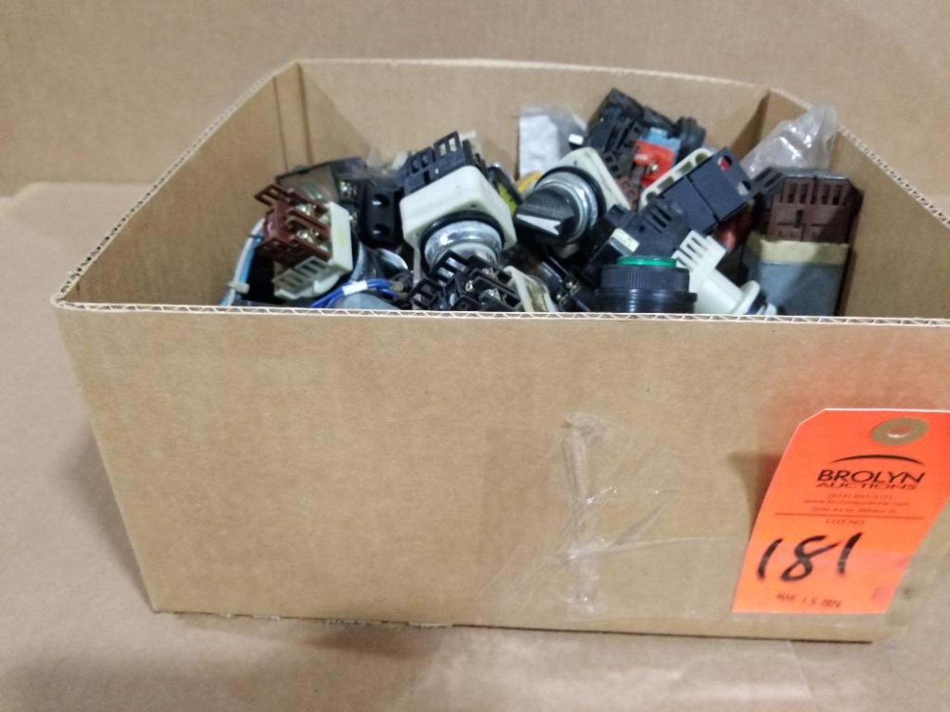 Large assortment of push buttons and switches.