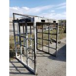 Heavy duty steel enclosure with fork pockets. 81in tall x 57in x 54in.