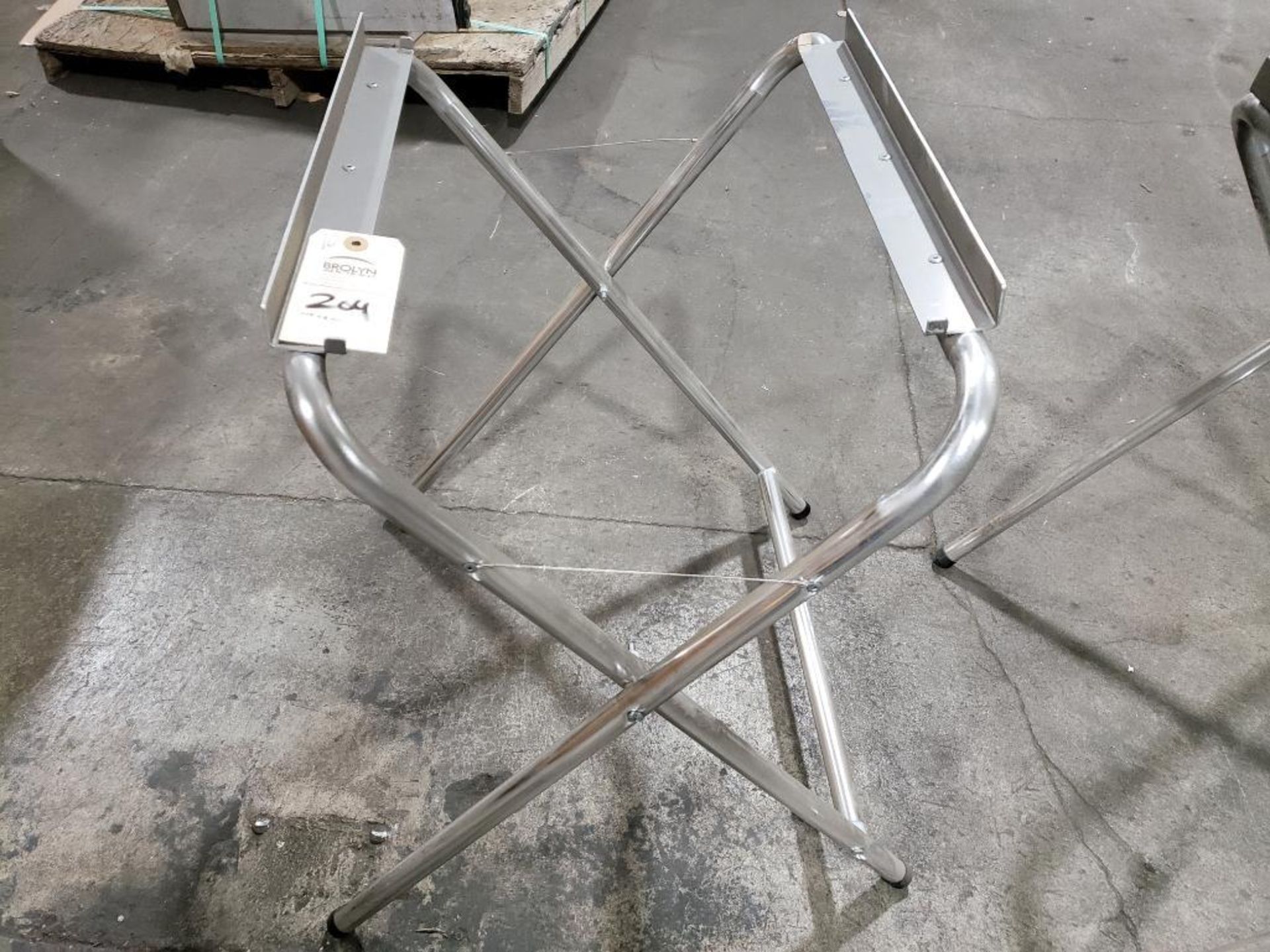 Qty 10 - Folding grill stands.