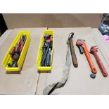 Assorted wrenches and hand tools.