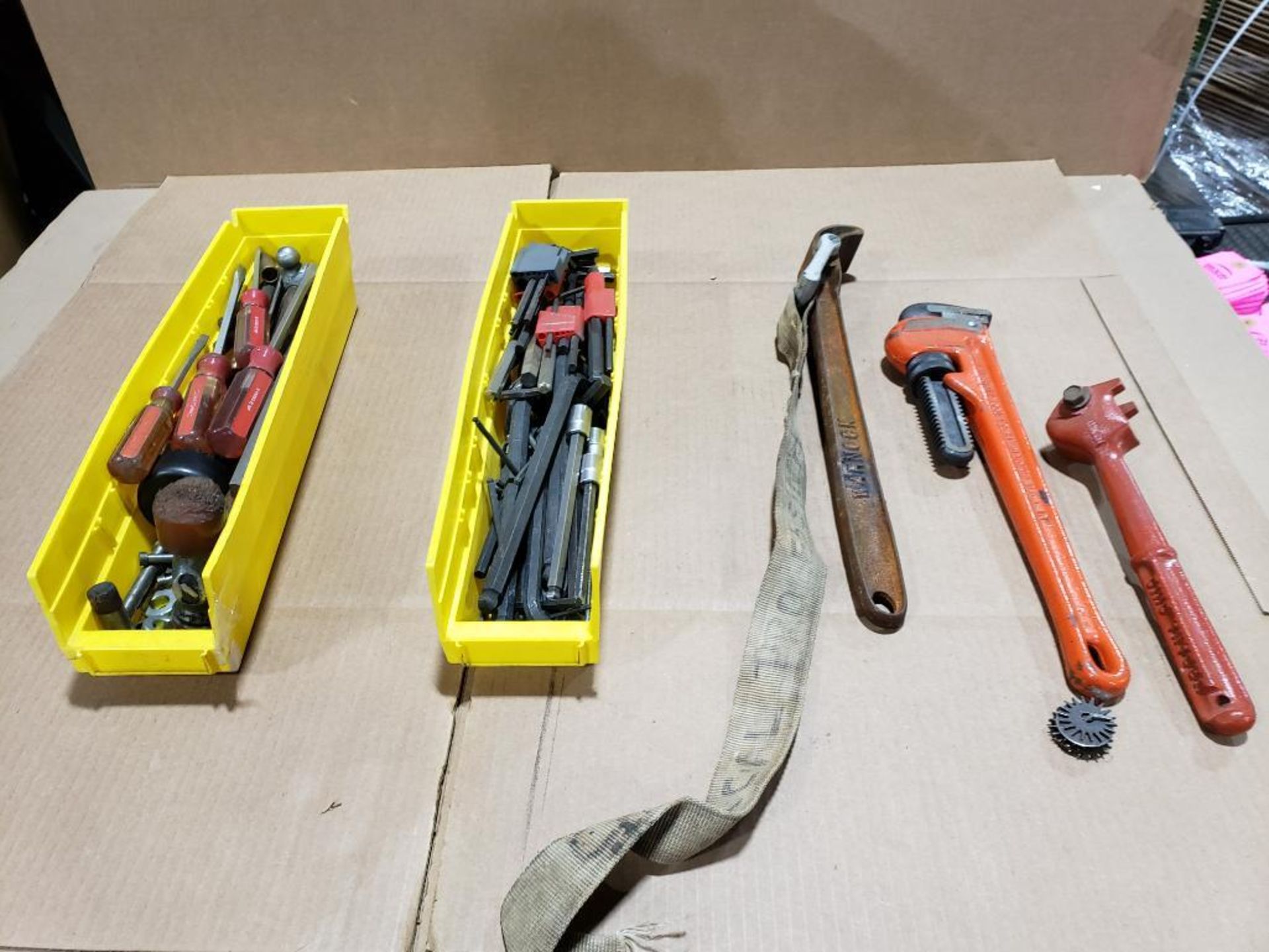 Assorted wrenches and hand tools.