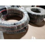 Large lot of assorted fuel fill hose.