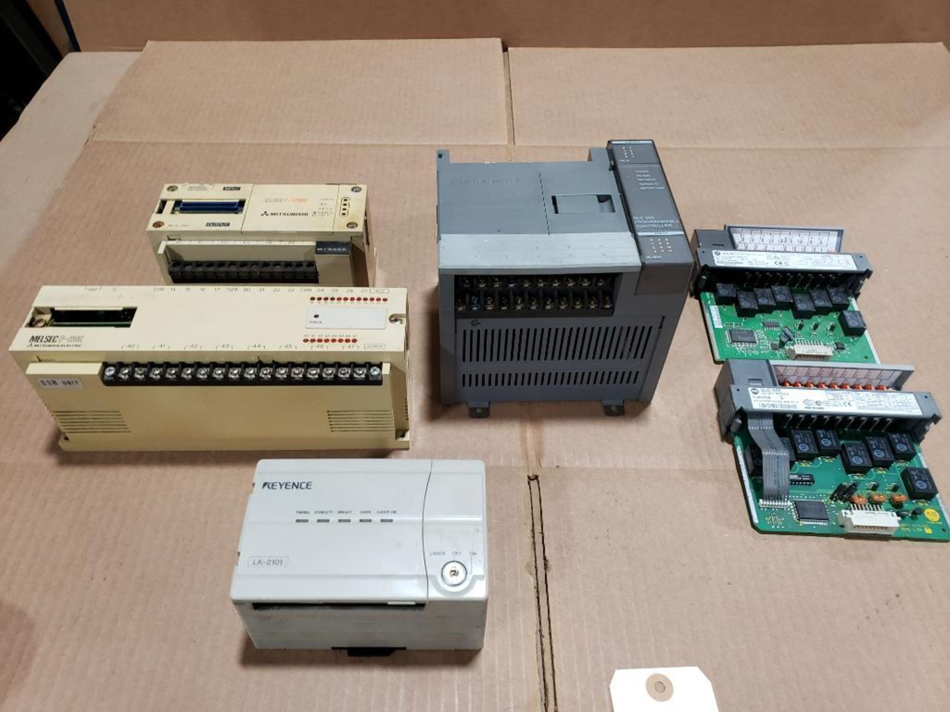 Assorted Keyence, Allen Bradley and Mitsubishi PLC and controls.