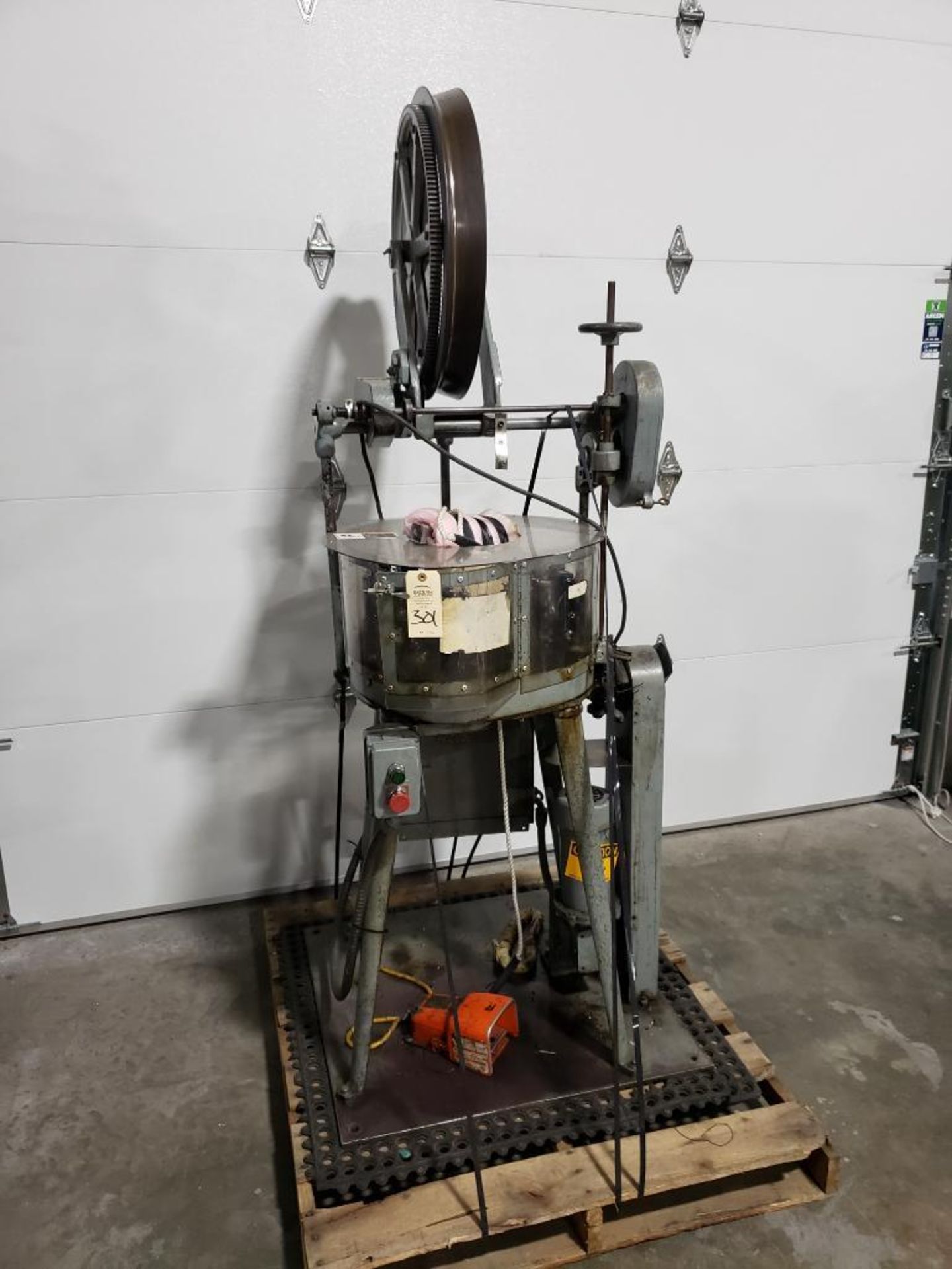 New England Butt vertical wire harness braiding machine.