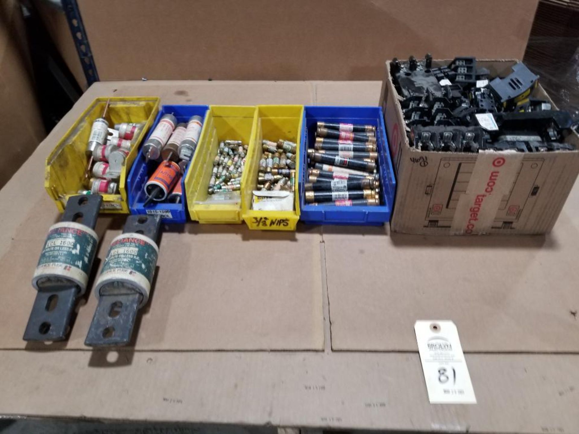 Large assortment of fuses and fuse holders.