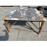 Heavy duty steel table. 50in x 56in x 29in tall.