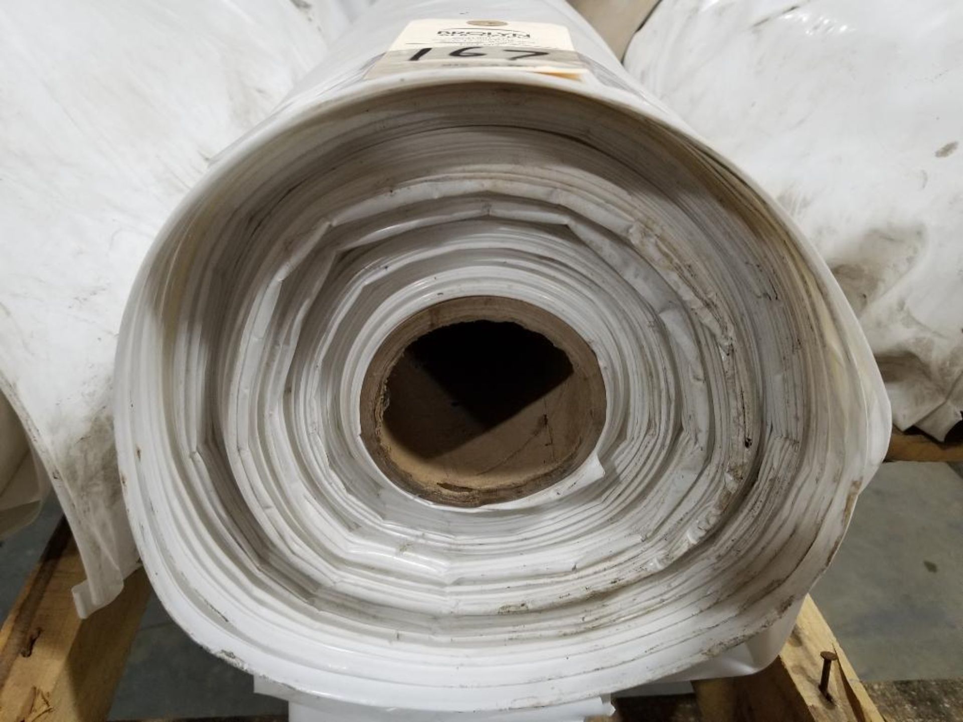 Large roll of plastic sheeting. - Image 2 of 3