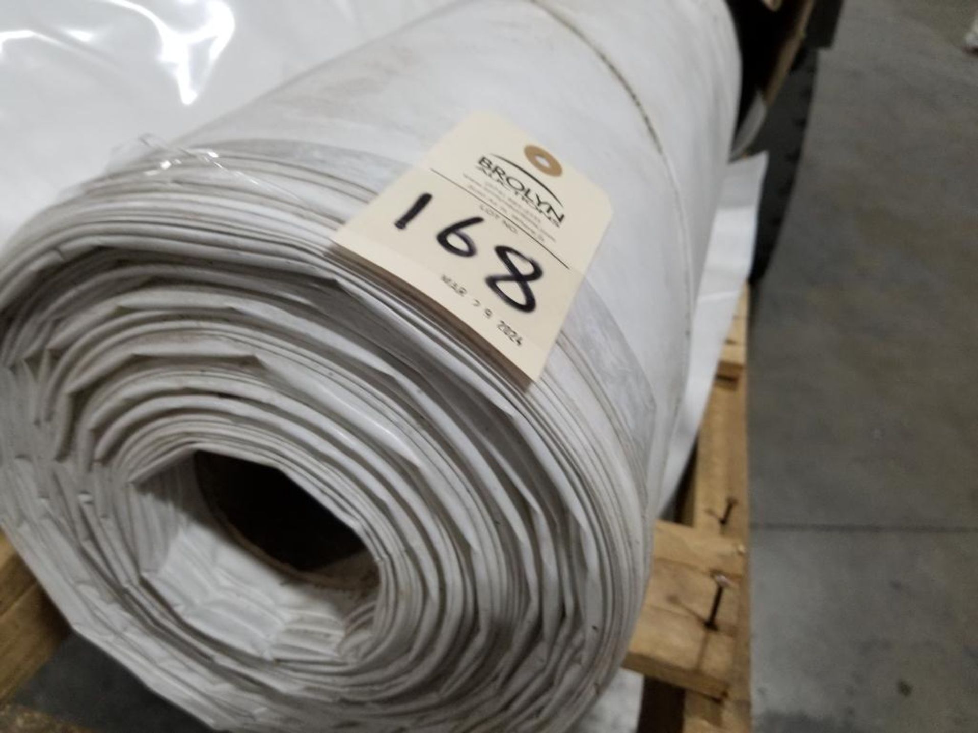Large roll of plastic sheeting. - Image 2 of 3