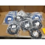 Large assortment of ethernet and other cables.