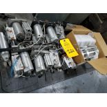Large assortment of pneumatic cylinders and actuators.