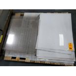 Pallet of white and clear plexiglass.