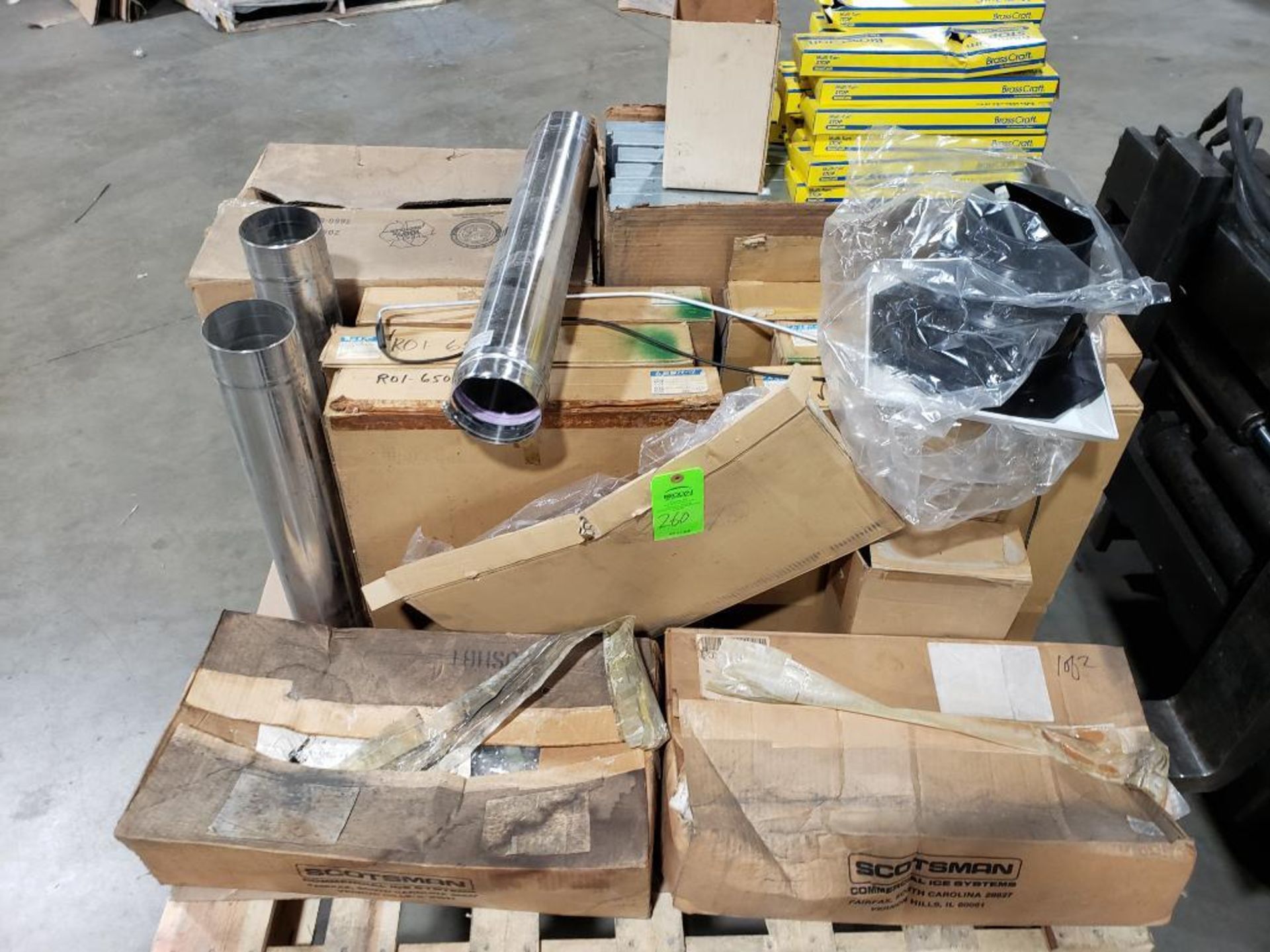 Pallet of assorted parts and hardware.