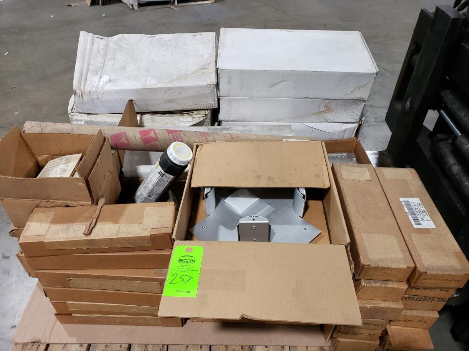 Pallet of assorted parts and hardware.