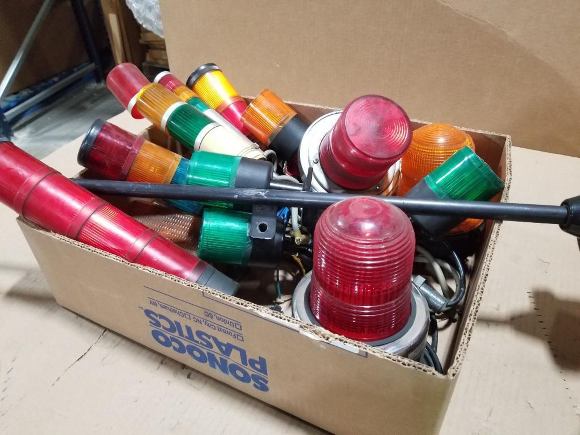 Large assortment of machine light stacks and beacon lights.