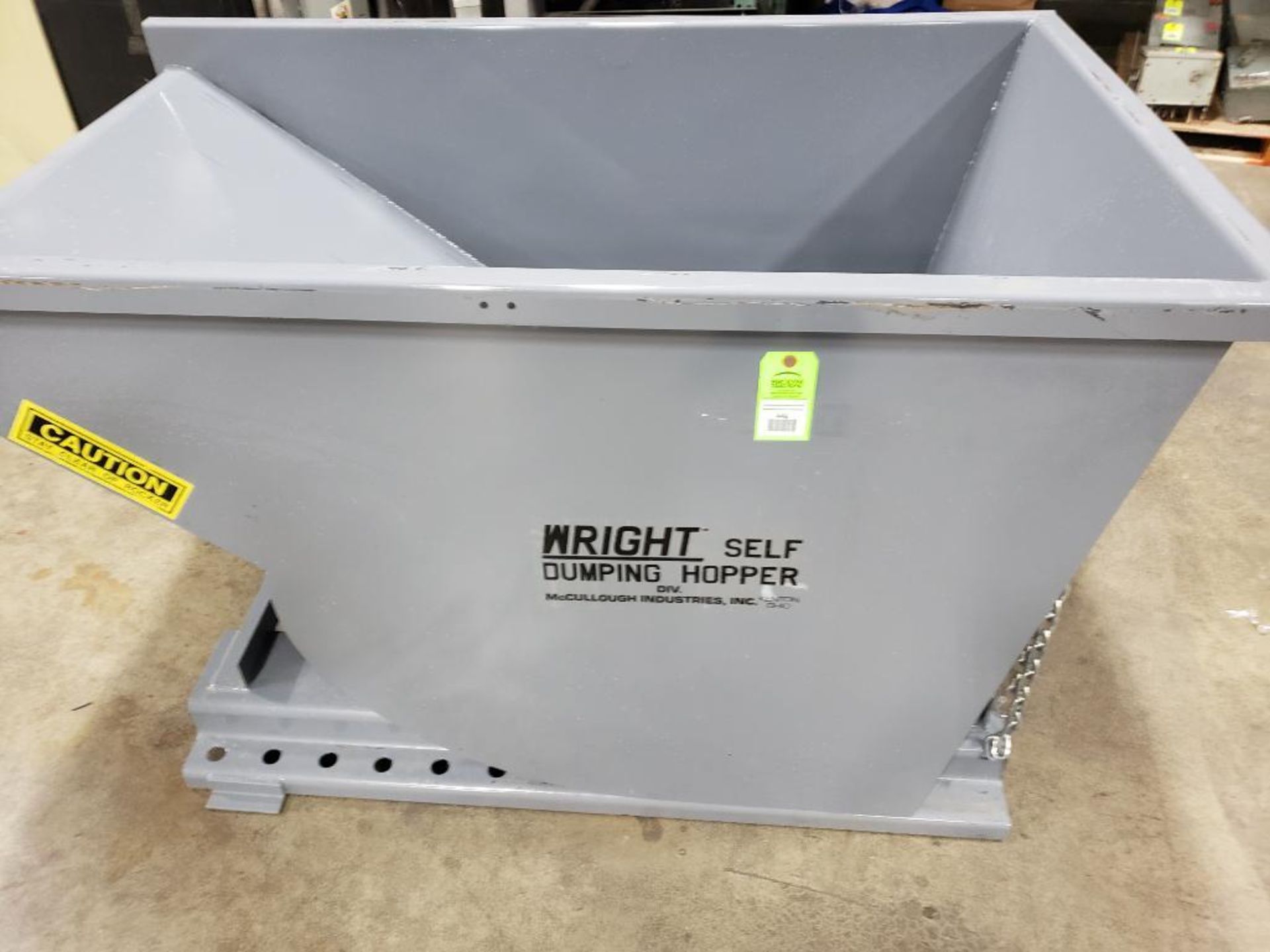 NEW 1-yard Wright / McCullough Industries steel dump hopper. 63.5"L x 39.75"W x 39.75"T.
