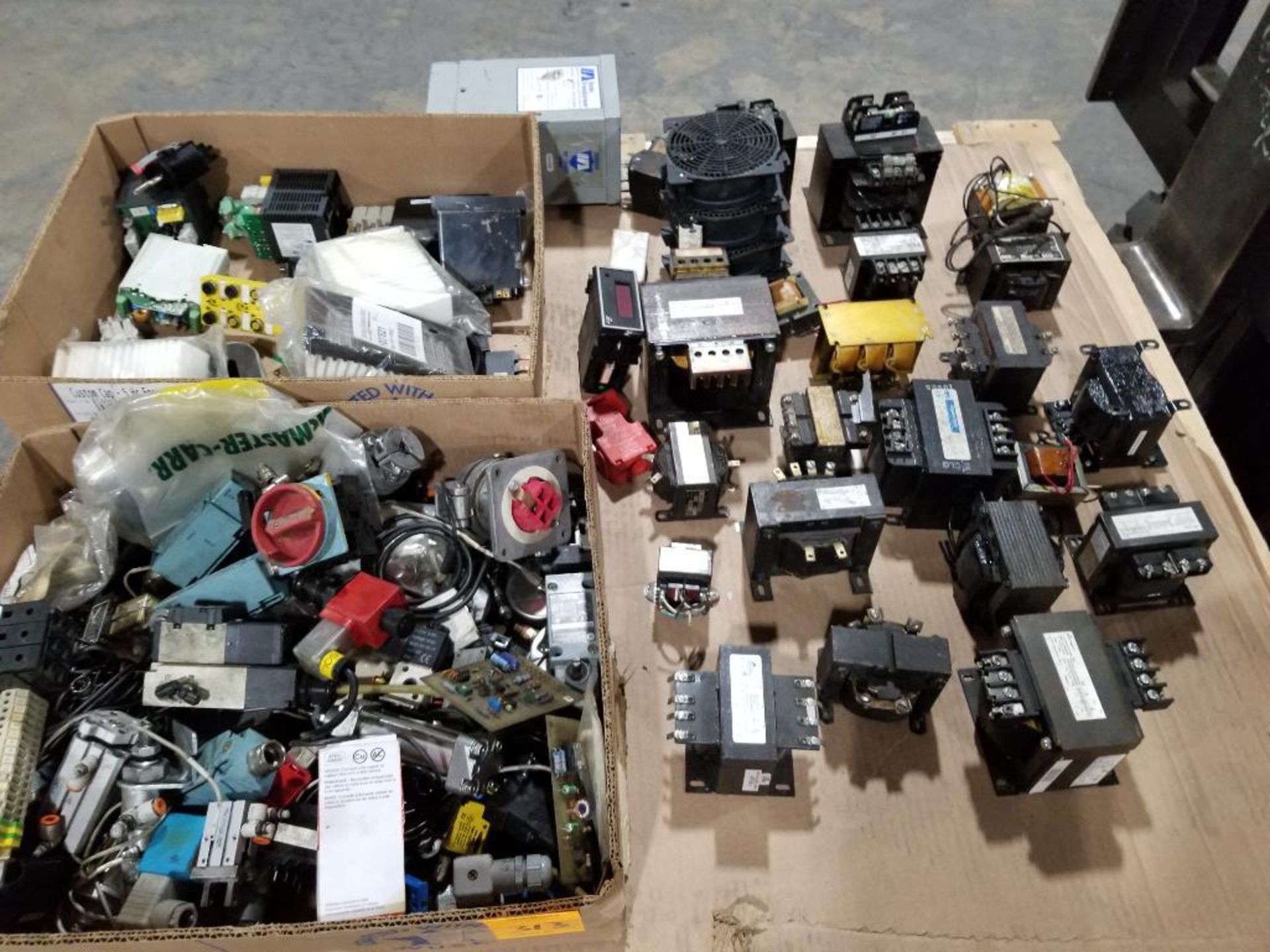 Pallet of assorted parts and hardware.
