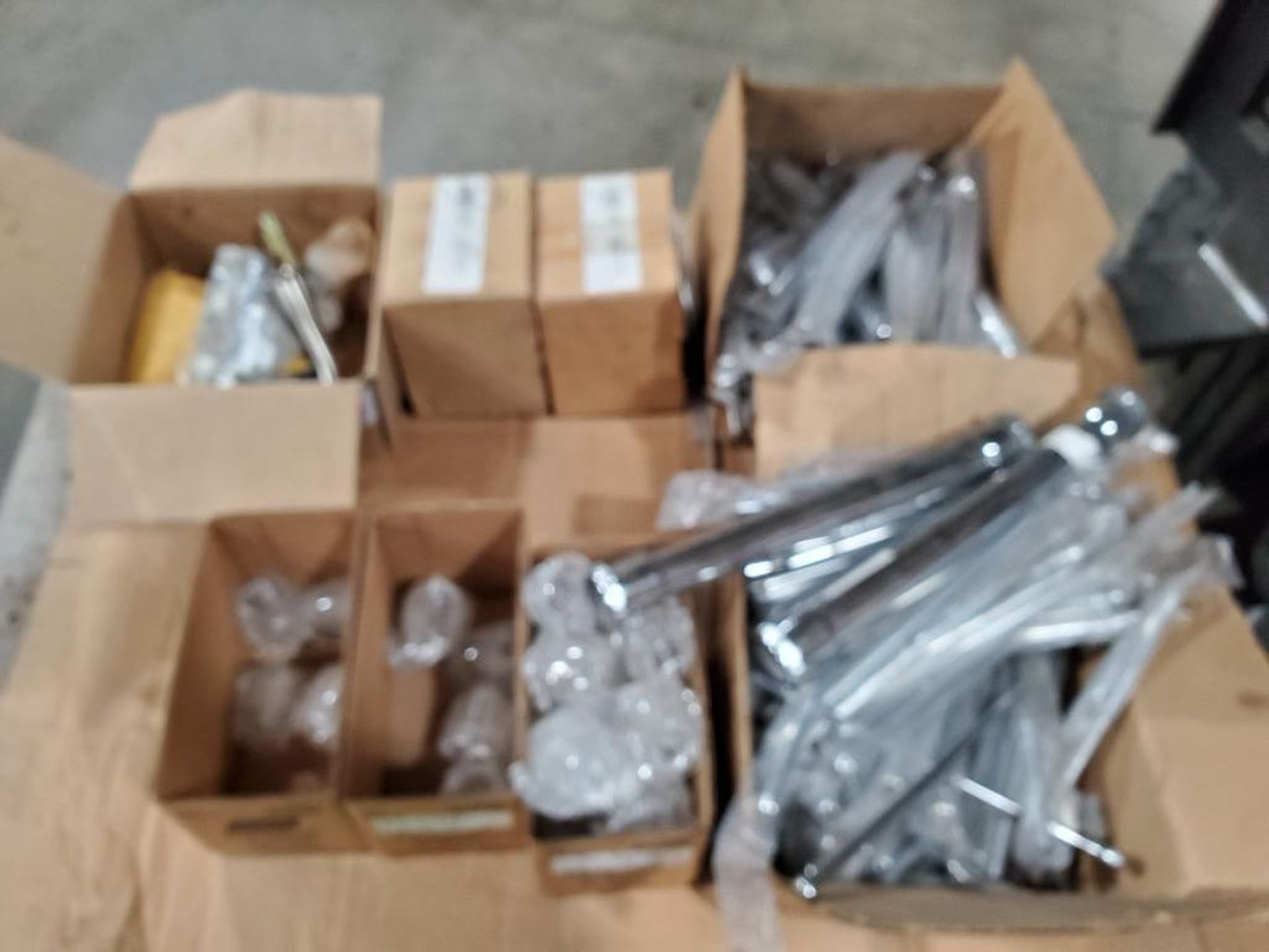 Pallet of assorted plumbing components.