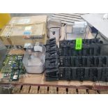 Pallet of assorted chargers and electrical.