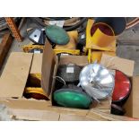Assorted traffic light parts and housings.