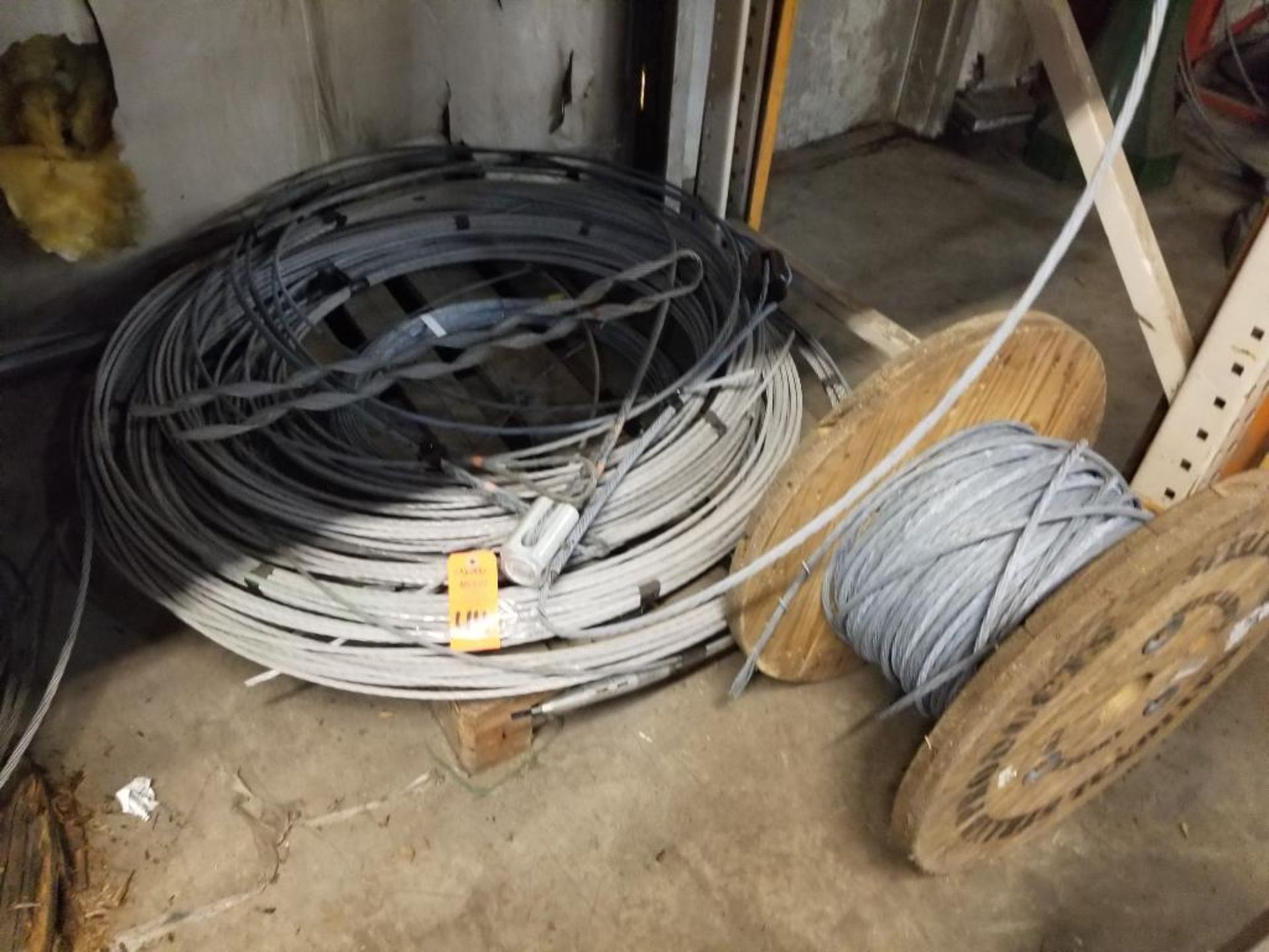 Pallet and Spool of bare wires.