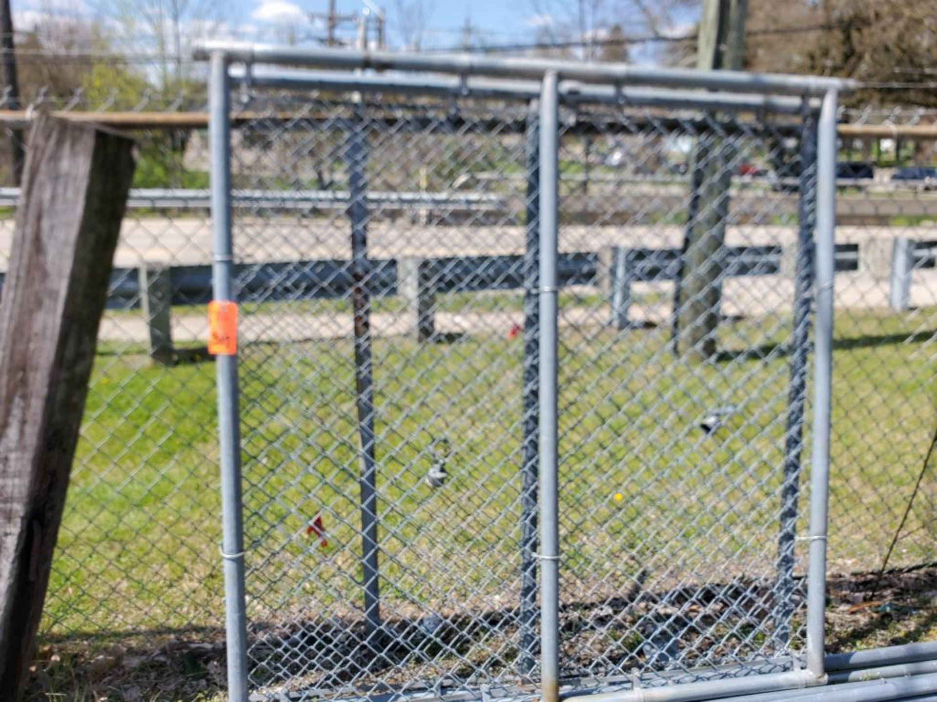 Large lot of chain link fence, gate, poles, etc.