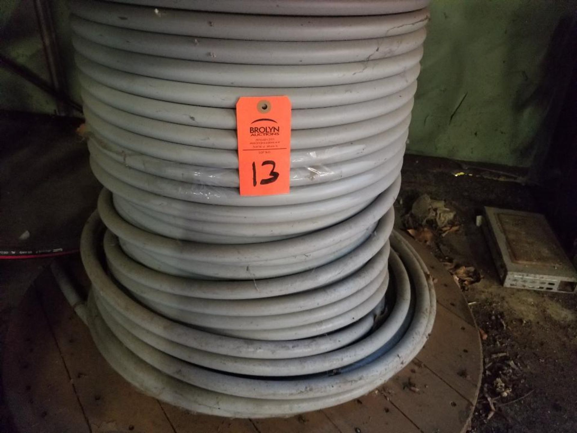 Spool of 15kV Hendrick spacer cable system wire 336, AAC-19X-PACT-15kV-75-3lyr.