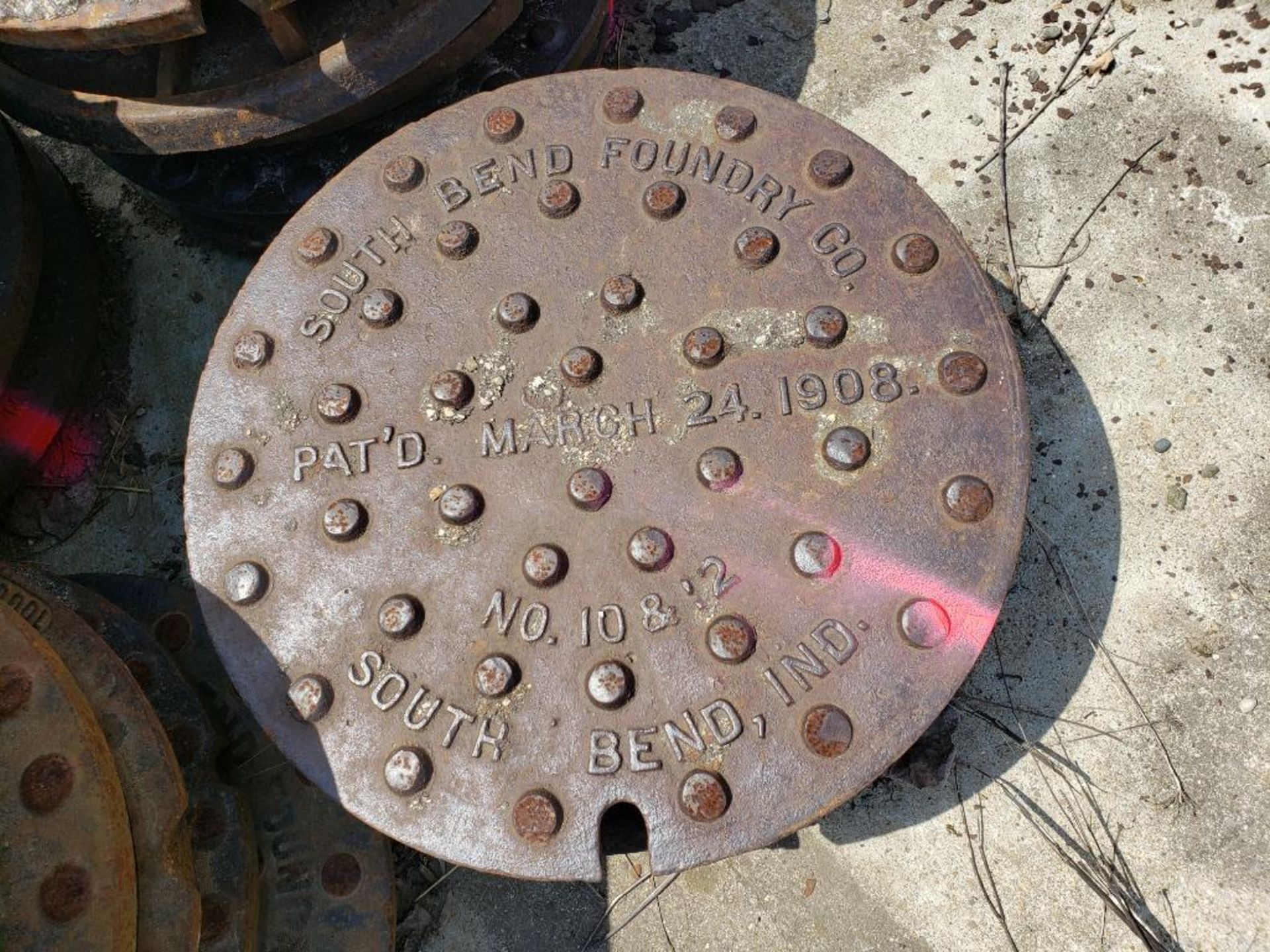 Assorted man hole covers. (units with pink marking are NOT included in lot) - Image 7 of 8